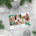 Cartão De Festividades Felizes Feriados da Colagem de Fotos Mistletogs Tw<br><div class="desc">Cartão de Natal fotográfico com uma colagem de fotos com quatro fotos e bonito galhos com azulejos em verde e azul claro. Os feriados felizes são escritos em um roteiro azul marinho e encantador. Adicione seu nome de família e o ano em fontes azuis elegantes. A parte traseira apresenta um...</div>