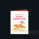 Cartão De Festividades Foi para a praia um doce canguru no Natal<br><div class="desc">Vai à praia este Natal? Conte a sua família e amigos com esta linda foto de férias de canguru e cartão de saudação. Cor aquosa original de um canguru branco em uma camisa de férias carregando prancha de surfe e vestida e chapéu de Papai Noel de Sarah Trett para www.mylittleeden.com...</div>