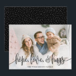 Cartão De Festividades Foto de Cheio de Script Elegante Hope Love Hugs Bl<br><div class="desc">Envie amor esta temporada para sua família e amigos com esses cartões modernos estilados por Orabella Impressões. A camada de texto elegante diz, "esperança, amor e abraços" em preto sobre uma camada branca de gradiente na parte inferior da placa. A parte de trás apresenta pequenos pontos brancos de neve sobre...</div>
