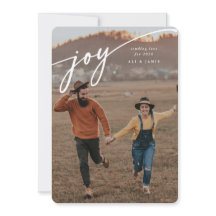 Foto plana de Ano Novo com escrita branca 'Joy' el