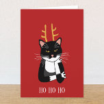 Cartão De Festividades Gato de Natal Sarcástico engraçado<br><div class="desc">Um sarcástico e incansável gato de smoking preto e branco com chifres de Natal. Ho ho ho,  e tudo isso. Personalize alterando ou removendo o texto na frente e no dentro.</div>