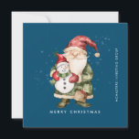 Cartão De Festividades Gnome e Snowman Feliz Natal Comercial Flat<br><div class="desc">Um gnomo vestido de vermelho fica ao lado de um boneco de neve com um chapéu de elfo verde e um cachecol vermelho. Eles estão cercados por uma poeira de neve branca que pop sobre o fundo azul escuro. A estética minimalista é criada por um simples Feliz Natal abaixo e...</div>