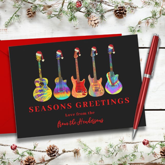 Cartão De Festividades Guitarras de Natal com Papais Noels Saudações de F (Cool music seasons greetings colorful guitars wearing Santa hats red and black holidays card)
