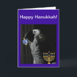 Cartão De Festividades Hanukkah, Cinza africana do Congo<br><div class="desc">Diversão design de um Popote Cinza Africano do Congo segurando um Dreidel ao lado de um Menorah para o Feriado Judeu.</div>