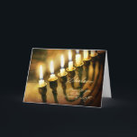 Cartão De Festividades Hanukkah Menorah ilumina Shalom, paz a você<br><div class="desc">Este cartão de Hanukkah parece incandescer com luz interna como as velas no menorah ilumina um livro antigo no fundo. Deseja elegante a paz destinatária,  "Shalom".  Chanukah/Hanukkah é a época do ano perfeita expressar seu desejo para a paz todos seus amigos e aos amados,  especialmente aqueles da fé judaica.</div>