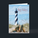 Cartão De Festividades Hatteras Lighthouse Beach Christmas - Holiday Card<br><div class="desc">Uma exibição tradicional de velas e árvores de férias artísticas em um cobertor na areia,  em frente ao Farol de Cabo Hatteras. Personalizar todo o texto.</div>