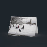 Cartão De Festividades Inverno que Sledding Jersey City<br><div class="desc">Uma família de 4 aprecia sledding em um parque coberto de neve do campo de Pershing em Jersey City,  New-jersey,  com uma igreja visível no fundo. Excelente para um cartão de Natal. Customizável - adicione sua própria mensagem com a ferramenta do texto da adição</div>