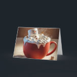 Cartão De Festividades Marshmallow Snowman<br><div class="desc">Um alegre homem de neve marshmallow relaxa em uma xícara de chocolate quente,  cercado por chantilly e mini marshmallows</div>