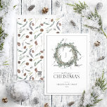 Cartão De Festividades Monograma Dusty Winter Wreath Merry Christmas Hold<br><div class="desc">Que melhor maneira de espalhar alegria de Natal do que com nosso Monograma Dusty Winter Wreath Merry Christmas Holiday Card? Esta bela carta apresenta uma coroa verde moderna adornada com eucalipto e elementos botânicos de inverno, moldando seu monograma. A palavra "Feliz" é escrita elegantemente em uma fonte de script, fazer...</div>