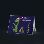 Cartão De Festividades Monstro engraçado de Loch Ness no Natal do chapéu<br><div class="desc">Vestir-se maravilhoso do monstro de Loch Ness do divertimento Natal da arte do original de luzes do papai noel chapéu e do Natal projeta.  Pode igualmente adicionar o texto feito sob encomenda e mudar a cor do fundo ao pedir.</div>