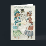 Cartão De Festividades Mulher Snowman Cigarro Monocle Top Hat<br><div class="desc">Este boneco de neve parece que está numa noite de diversão. Este impressão de natal vintage representa duas mulheres segurando a cabeça de um boneco de neve. O boneco de neve tem um monóculo, um chapéu de cima e um cigarro na boca. É uma cena de vitória por toda a...</div>