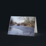 Cartão De Festividades Narrowboat em um canal congelado<br><div class="desc">Um cartão do Natal ou do ano novo com uma foto narrowboat tradicional Aber de Woolwich do vintage de um grande que quebra através do gelo no canal grande da união no Reino Unido,  com uma cisne que anda no gelo e em um fechamento no fundo.</div>