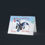Cartão De Festividades Natal através das milhas, pinguins na neve<br><div class="desc">Dois pinguins estão olhando com perplexidade em um bastão de doces que cola fora da neve quando um boneco de neve de sorriso olhar sobre na distância. Os flocos de neve estão caindo toda ao redor. Esta é uma cena encantador do feriado para os jovens no coração. Faz um feriado...</div>