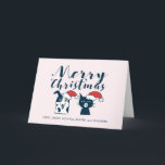 Cartão De Festividades Natal bonito da ilustração do cão e gato do papai<br><div class="desc">Ilustração do estilo dos desenhos animados de um cão e gato bonito que veste chapéus do papai noel. Eu tentei retratar as características dos cães e gato em suas caras. O cão tem sua língua para fora e sorrindo inocente. O gato olha unamused e irritado. Desenho bonito e engraçado do...</div>