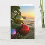 Cartão De Festividades Natal de Califórnia<br><div class="desc">Noite de Natal no por do sol na praia bonita na angra de cristal,  Califórnia.</div>