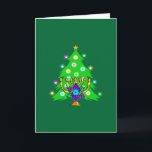 Cartão De Festividades Natal e Hanukkah Juntos<br><div class="desc">Natal e Chanucá sobre presentes para famílias inter-religiosas que celebram a alegria do Natal e a beleza de Chanukah.  Apresentando a árvore e menorah do Natal com a estrela judia de David cercada por presentes de feriado em cartões de saudação,  postagem,  ideias de presentes e roupa para a família.</div>