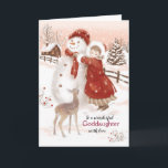 Cartão De Festividades Natal, Goddaughter, cervos, menina e boneco de<br><div class="desc">Neste cartão de Natal do estilo do vintage para o Goddaughter, eu pintei uma menina doce que amarra um lenço vermelho em torno do pescoço de um grande boneco de neve. Um cervo bonito do bebê olha sobre. A menina está vestindo um vestido longo sob um casaco vermelho pesado com...</div>