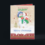 Cartão De Festividades Natal, Godson. Boneco de neve com filhote de<br><div class="desc">Um cartão de Natal doce para um Goddson novo. Caracteriza uma criança pequena adorável da neve que abraça um filhote de cachorro bonito da neve. Está vestindo um chapéu azul, um lenço verde e umas luvas vermelhas quando seu filhote de cachorro vestir um chapéu do papai noel. A neve está...</div>