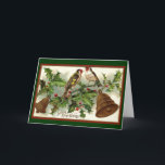 Cartão De Festividades Natal vintage Bels Dourados e pássaros<br><div class="desc">Um design do vintage com azevinho, os sinos do ouro e os pássaros festivos do Goldfinch. As palavras dizem: Desejos de amor do Xmas. O cartão interno lê: O tempo do Natal é uma estação da grande alegria. É um momento de recordar o passado e da espera para o futuro....</div>