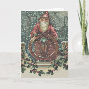 Cartão De Festividades Navio de Papai Noel na tempestade de neve de azevi