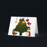 Cartão De Festividades O boneco de neve bonito da árvore dos feriados do<br><div class="desc">Design bonito do Natal com um pássaro que decora uma árvore de Natal com estrelas e corações.  O pássaro está estando sobre um boneco de neve.</div>