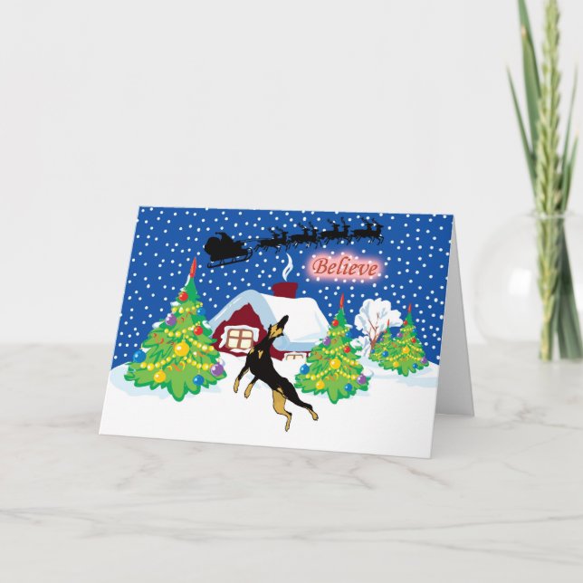Cartão De Festividades O Doberman acredita no Natal do papai noel (Frente)