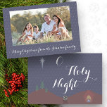 Cartão De Festividades O Foto de Natal da Noite Santa<br><div class="desc">Oh noite sagrada, as estrelas estão brilhando intensamente... Mande seus desejos de Natal este ano com este cartão com fotos personalizável celebrando o nascimento de Jesus. A frente do cartão é desenhada com um padrão estelar simples sobre um fundo azul. A frente permite a colocação de uma foto da família....</div>