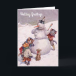 Cartão De Festividades O natal vintage carda, boneco de neve & gatos<br><div class="desc">Um cartão de Natal antigo que caracteriza alguns gatos que constroem um boneco de neve, tendo uma grande estadia. A imagem é do artista Arthur Thiele, cujos os trabalhos atrasados dos 1800s são famosos para descrever animais antropomórficos - gatos em particular - em engraçado, humano-como cenas. A parte dianteira do...</div>