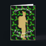 Cartão De Festividades O papai noel do Natal estaria caminhando<br><div class="desc">O foco principal do design é um caminhante no grupo dourado da silhueta contra um fundo de repetir as folhas do azevinho no preto. O tag-line do defeito lê, "Natal está vindo. Se o papai noel não era ocupado estaria caminhando". Todos os textos dos cumprimentos podem facilmente ser substituídos com...</div>