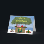 Cartão De Festividades Ocean Beach Tropical Tiki Hut Bebe Diversão de Nat<br><div class="desc">Este tema tropical tem tudo - bebidas misturadoras, champanhe e cerveja em uma bandeja, um chapéu de santa, uma coroa de férias com uma estrela, e o bar da beachy tiki na areia com o oceano ao fundo. Feliz Natal está escrito no telhado do bar tiki. Um tema de ilha...</div>
