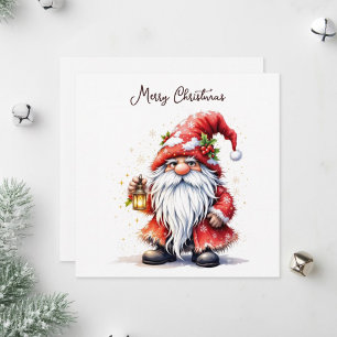 Cartão De Festividades Papai Noel segurando uma lâmpada brilhante.