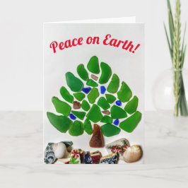 Cartão De Festividades Paz na Árvore de Natal de Vidro do Mar da Terra
