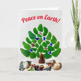 Cartão De Festividades Paz na Árvore de Natal de Vidro do Mar da Terra