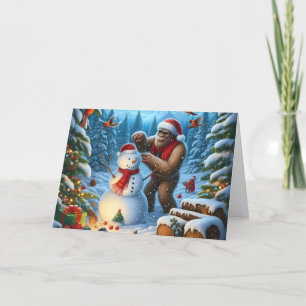 Cartão De Festividades Pé Grande Fazendo Boneco de Neve Natal