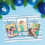 Cartão De Festividades Peace Love Joy | Blue 3 Photo Christmas<br><div class="desc">Beautiful sky blue wavy lines decorate the background of this modern family photo collage Christmas card. Personalize with your 5x7 family pictures and replace the 3 photographs with your own happy children. The perfect beach family Christmas card that reads PEACE LOVE JOY in chic blue typography next to each photo....</div>