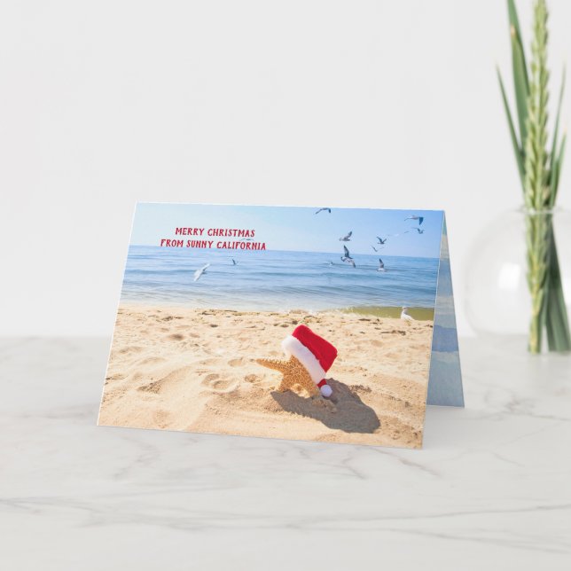Cartão De Festividades Peixe-estrela do Papai Noel na areia da praia (Frente)