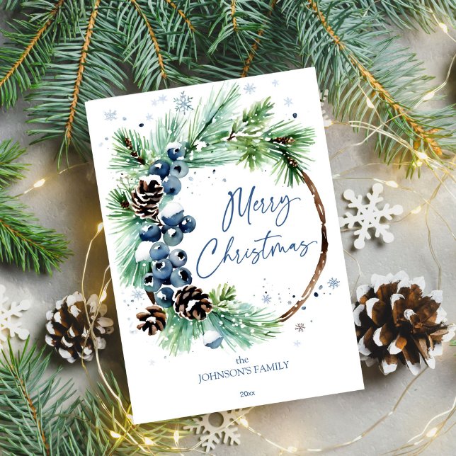Cartão De Festividades Pinheiros de neve com aquarela de Natal (Merry Christmas template holiday greeting card watercolor pine wreath blue winter berries pinecones)