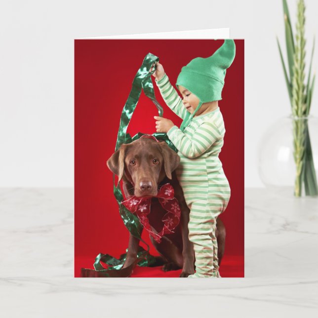 Cartão De Festividades Rapaz pequeno que decora um cão (Frente)