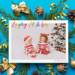 Cartão De Festividades Rindo Por Todo O Caminho Foto De Natal Bela Do Arc<br><div class="desc">Belo e colorido cartão de Natal horizontal com Laughing All the Way em bonito escrita cursiva arco-íris. Personalize com sua fotografia da família favorita de seus filhos sorridentes acima do seu nome ou saudação personalizada em vermelho. Cartões de natal divertidos e alegres com uma fotografia segundo nas costas.</div>