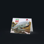 Cartão De Festividades Rota 66 Catoosa Blue Whale Christmas Santa Hat<br><div class="desc">Visitar a Baleia Azul de Catoosa,  Oklahoma ao longo da Rota 66 é mágico a qualquer momento do ano. O favorito da América Latina é visto normalmente vestindo um boné de beisebol. No entanto,  no Natal,  esta imagem de fantasia mostra a baleia vestindo um chapéu de Papai Noel.</div>