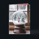 Cartão De Festividades Snowman No Globo De Neve De Natal<br><div class="desc">Um bonitinho bonitinho no globo de neve de Natal perto de uma janela de inverno. O texto dentro pode ser alterado.</div>