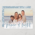 Cartão De Festividades Snowy Peace | Foto de Hanukkah<br><div class="desc">Cartões com fotos modernos de Chanucá apresentam sua imagem favorita com uma borda branca de flocos de neve ao longo da parte inferior. "Paz e luz" aparece em tipografia azul clara com letras de pincel,  com seus nomes e o ano abaixo.</div>