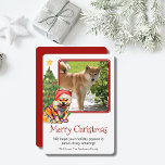 Cartão De Festividades Tan Shiba Inu e o Cão-de-Pé-Árvore de Natal - Uma<br><div class="desc">Este cartão de Natal do Shiba Inu, bonito, apresenta um Shiba bronzeado vestindo um chapéu de Papai Noel sentado em frente a uma árvore de Natal iluminada. A saudação no cartão diz "Feliz Natal", a mensagem diz "Esperamos que a sua época de férias seja surpreendente!" e finalmente há uma saudação....</div>