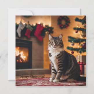 Cartão De Festividades Um gato com árvore de Natal e lareira