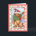 CARTÃO DE FESTIVIDADES UMA ESTRELA<br><div class="desc">Um urso de ursinho que guardara um ornamento acolchoado da estrela tem uma grinalda em torno de seu pescoço e um chapéu do papai noel está ligada um ajudante para a decoração do feriado. A imagem foi rendida no gouache.</div>