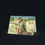 Cartão De Festividades Vintage Art Victorian Family Christmas Cena<br><div class="desc">Este é um cartão de Natal personalizável que apresenta uma família vitoriana vintage numa cena de neve com veado. Você pode personalizar esta placa adicionando sua foto de família ou outra imagem no dentro, além de adicionar uma legenda para essa imagem. Você também pode personalizar o cartões de natal dentro...</div>