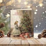 Cartão De Festividades Vintage Felry Christmas Tree Girl Gifts<br><div class="desc">Cartão de cartões de natal dobrado com uma pintura de vintage de uma menina decorando uma árvore de Natal com presentes embrulhados por baixo. O texto diz, "Feliz Natal" mas é personalizável para sua própria saudação. Personalizado no verso com sua mensagem e seu nome. Entre em contato comigo para obter...</div>