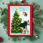 Cartão De Festividades Vintage Lady Decorating Christmas Tree (Árvore de<br><div class="desc">Vintage Lady Decorating Christmas Tree Holiday Card,  1920.</div>