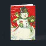 Cartão De Festividades Vintage Snowman Christmas<br><div class="desc">Um boneco de neve vintage em um fundo vermelho com uma saudação de Natal.</div>