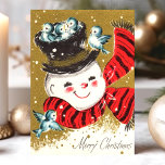 Cartão De Festividades Vintage Snowman E Bluebird Feliz Natal<br><div class="desc">Vintage Snowman E Bluebird Feliz Cartão De Natal. Este design apresenta um boneco de neve com pássaros azuis. Que bela cena de feriado retrô. Personalize este design personalizado com sua própria saudação de dentro.</div>